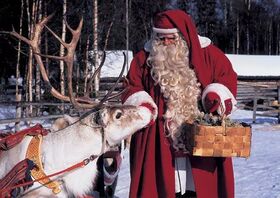 Tomten med sin Rudolf – du träffar dem båda i Rovaniemi.